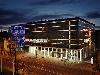 «Nordic Hotel Forum» отель - предварительное фото Отель ночью