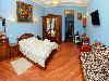 «Первый доходный дом» отель - предварительное фото Семейная комната Luxe с двуспальной кроватью и широким диваном (литер Е)