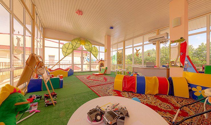 Фото отеля («Черноморская» комплекс малых гостиниц) - Детская комната
