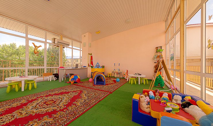 Фото отеля («Черноморская» комплекс малых гостиниц) - Детская комната