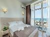 «ДельМарИнн» отель - предварительное фото 2местный номер с балконом и с видом на море. 1 фото