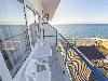 «Шторм» гостиница - предварительное фото Стандарт 3-местный с балконом, вид на море боковой