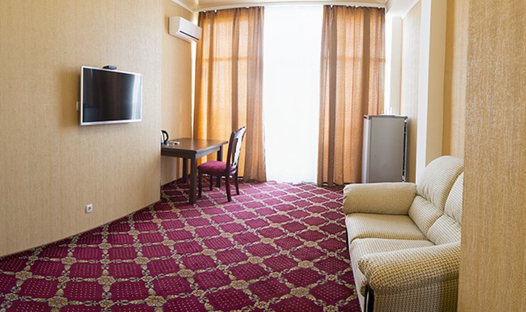 Фото отеля («Россия» гостиница) - Люкс 4-местный 2-комнатный
