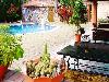 «Омега клуб» отель - предварительное фото Бассейн с летней площадкой