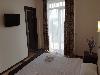 «Севастопольская Усадьба» мини-отель - предварительное фото Семейный 4-местный 2-комнатный с балконом и видом на море