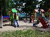 «Усадьба Приморский парк» отель - предварительное фото Детская площадка на территории парка