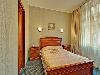 «Шерстон» гостиница - предварительное фото Люкс спальня