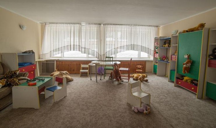 Фото отеля («Солнечная поляна» пансионат) - Детская комната