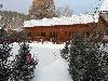 «Усадьба Еловое» отель - предварительное фото Вид на бунгало зимой