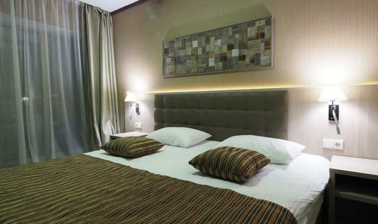 Фото номера («Arkhyz Royal Resort & Spa» отель) - Deluxe с кроватью king/twin-size