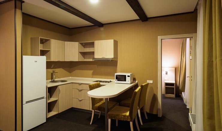Фото номера («Arkhyz Royal Resort & Spa» отель) - Семейный Luxe с одной спальней и кухней