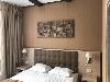 «Arkhyz Royal Resort & Spa» отель - предварительное фото Deluxe с кроватью king/twin-size