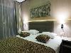 «Arkhyz Royal Resort & Spa» отель - предварительное фото Deluxe с кроватью king/twin-size